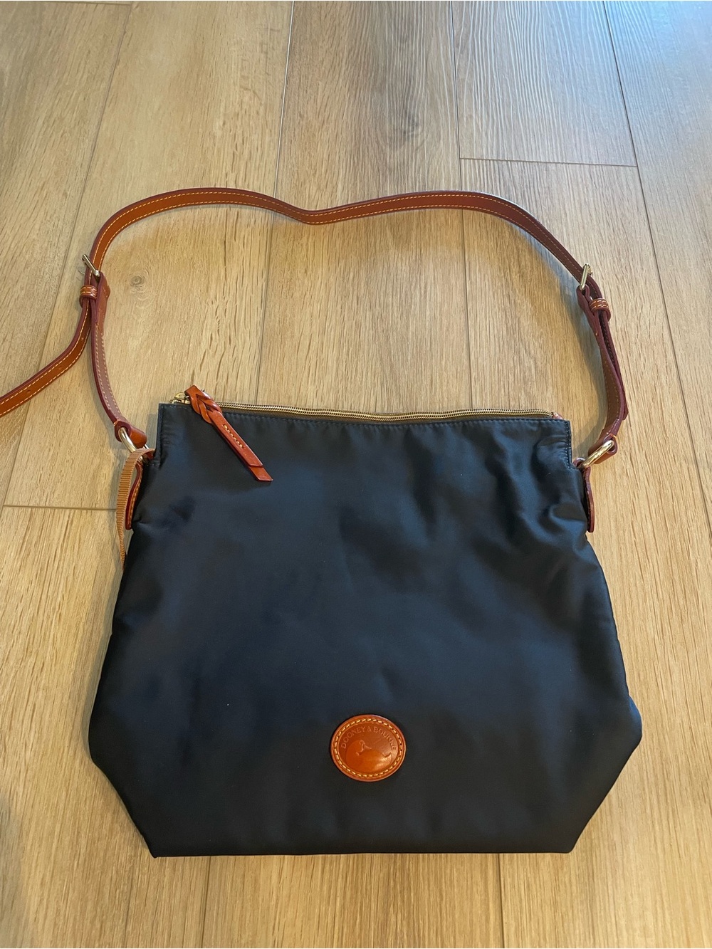 Dooney & Bourke Navy Blue Nylon Crossbody with Brown Leather Trim like new